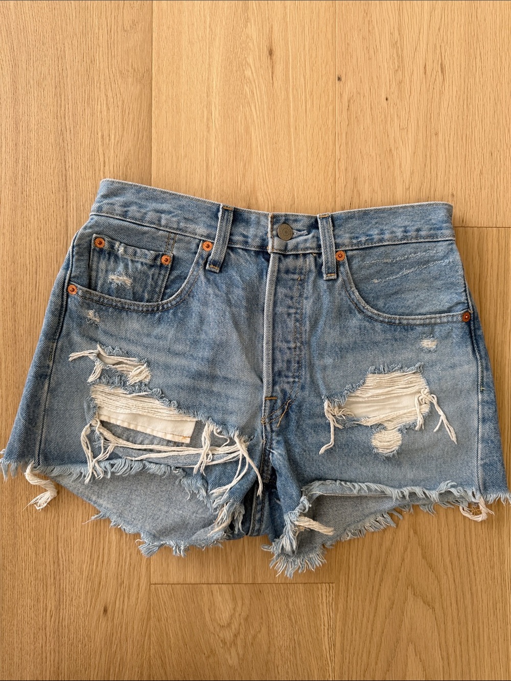 Levi’s Light Blue Distressed Denim Shorts